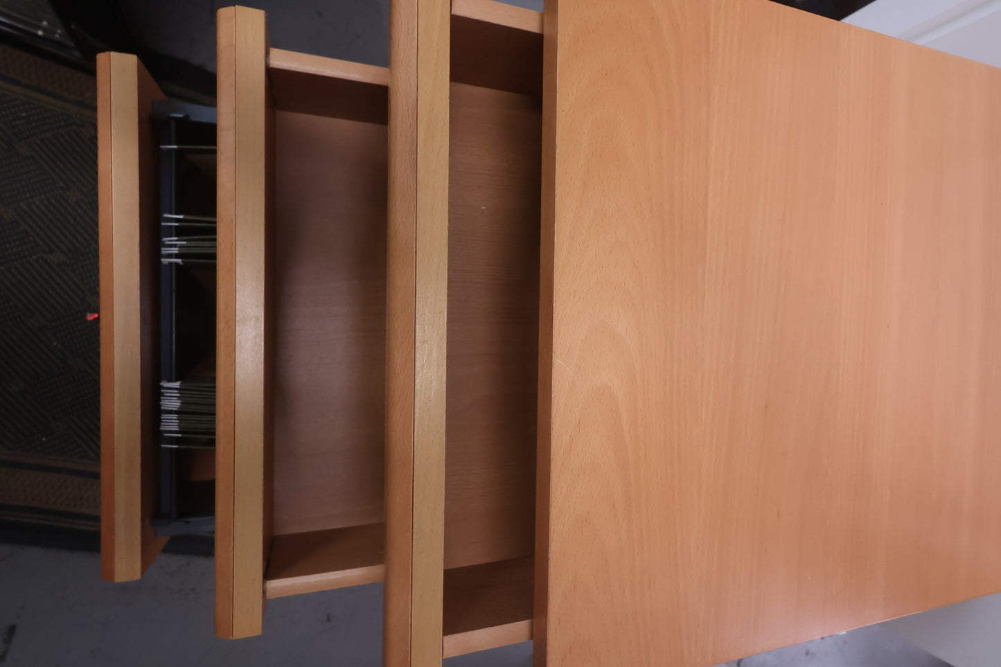 Rolling wood filing cabinet