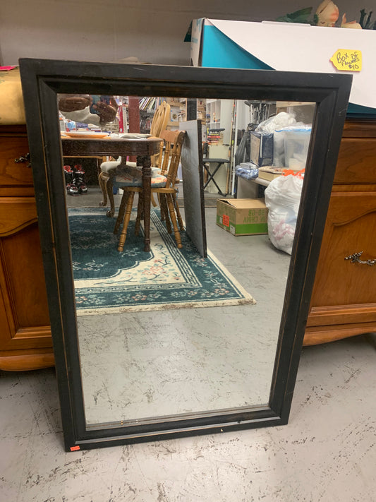 Rectangular mirror with solid black frame