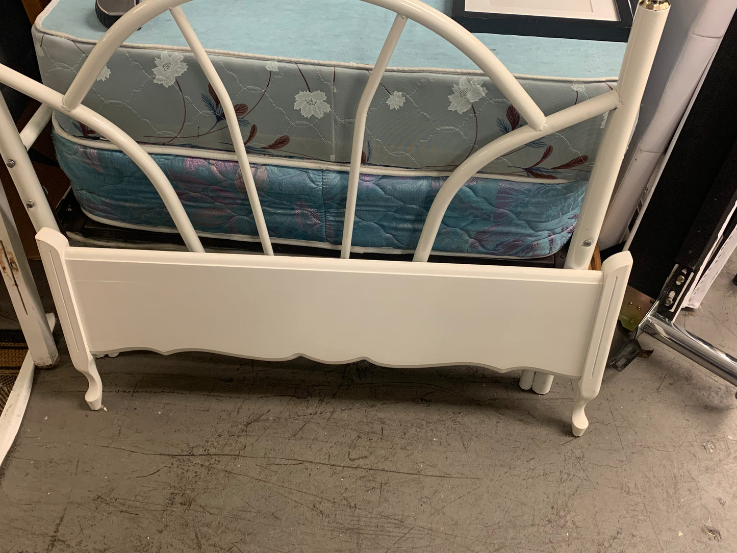 Single sized bed frame with footer