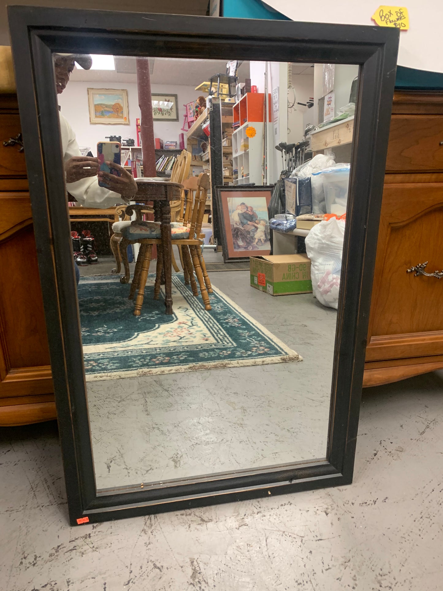 Rectangular mirror with solid black frame
