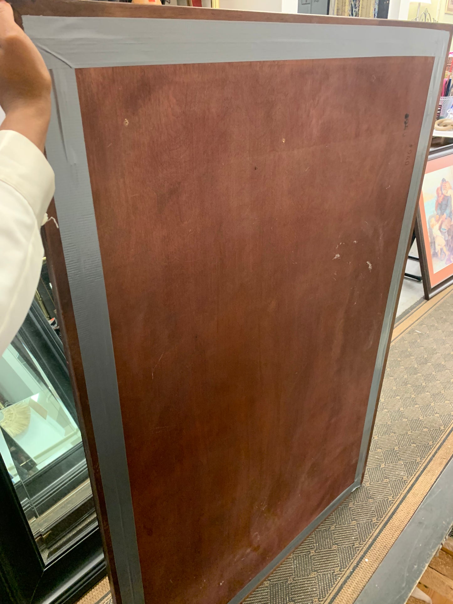 Large mirror framed with hardwood