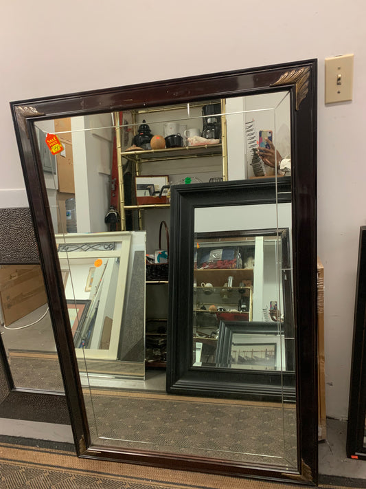 Large mirror framed with hardwood