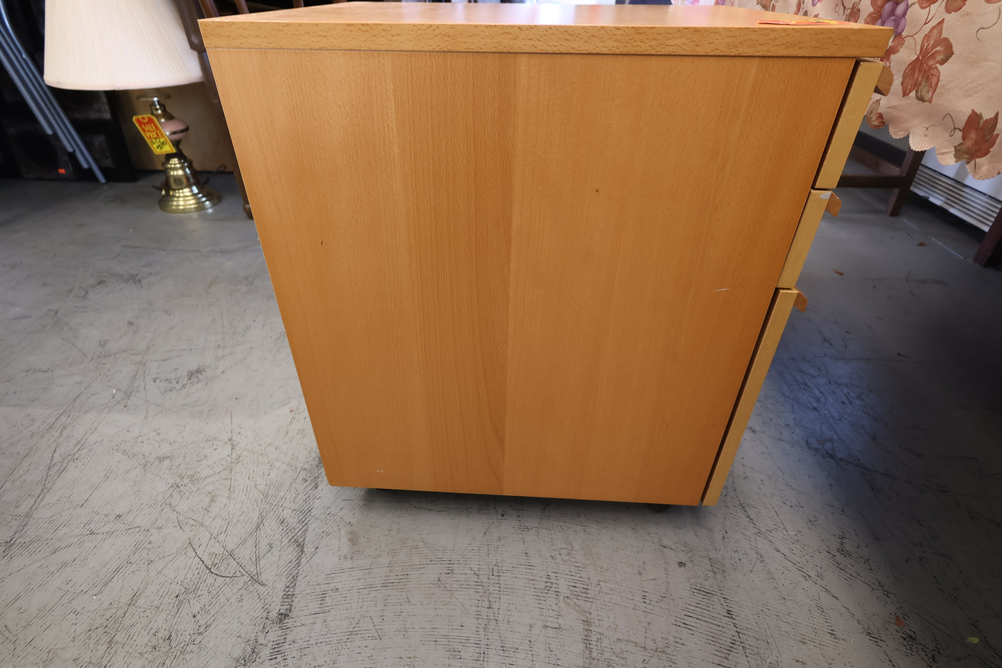 Rolling wood filing cabinet