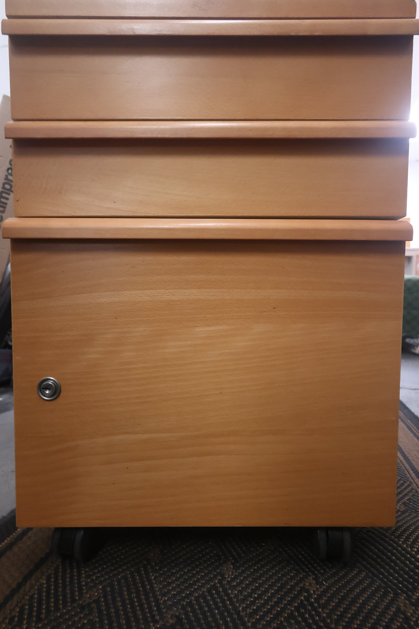Rolling wood filing cabinet